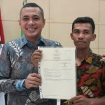 Andar Amin Harahap Serahkan 1.900 Sertifikat Tanah PTSL di Paluta: Bentuk Kepastian Hukum dari Negara